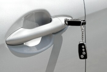 Automotive locksmith providing car key services